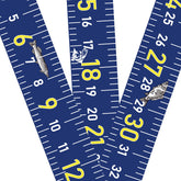 Blue 51 inch fish measuring tape sticker applied to boat